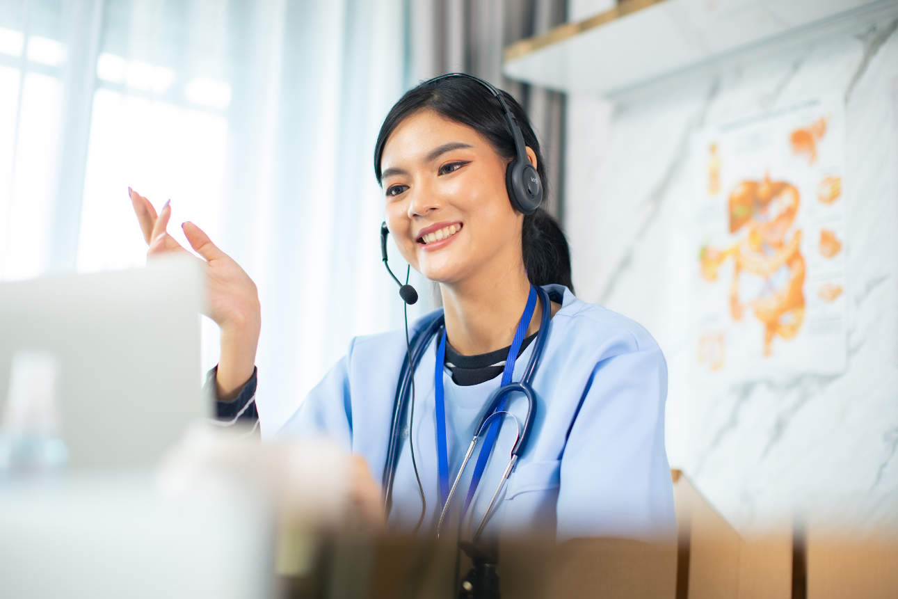 Female healthcare BPO worker taking a client call