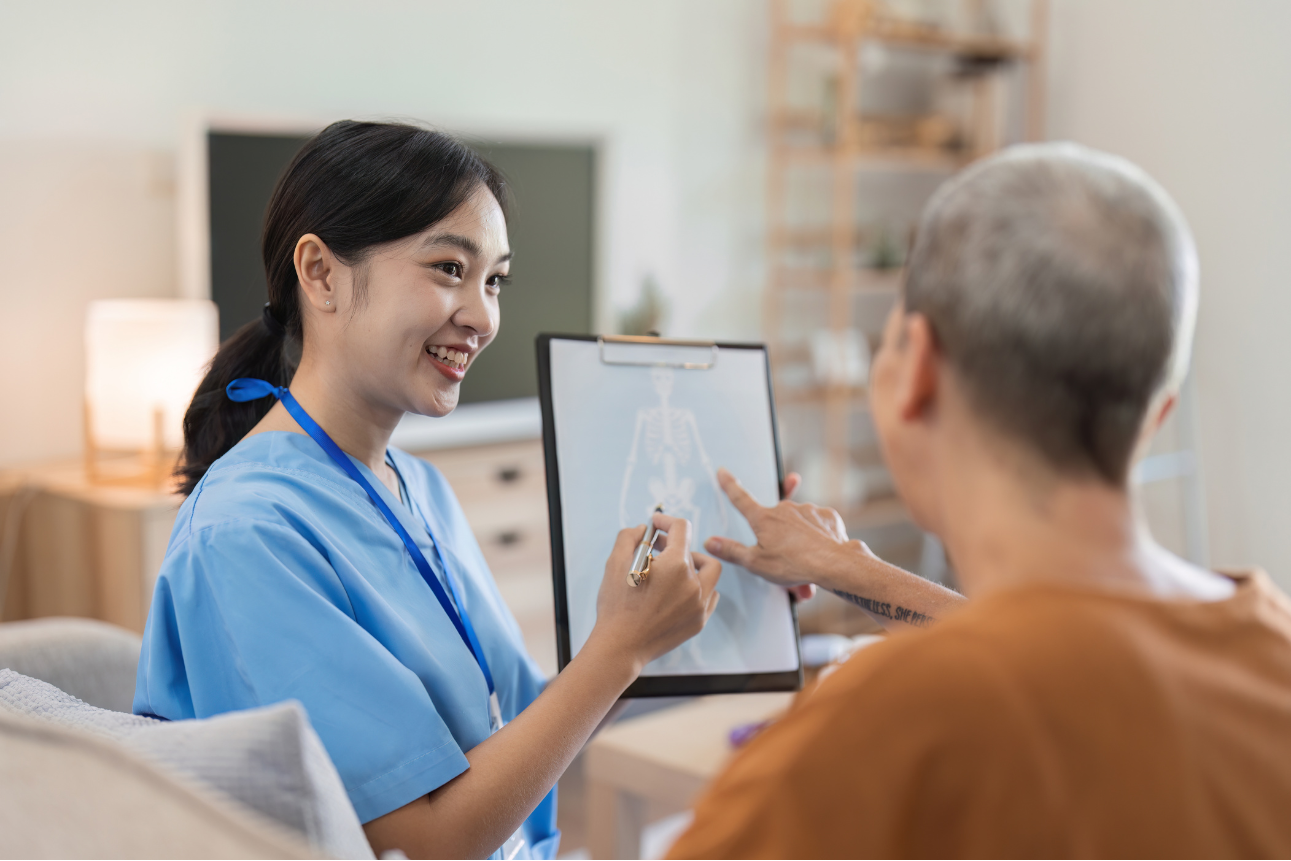 Nurse providing home care and reviewing a medical report to support the patient care experience.