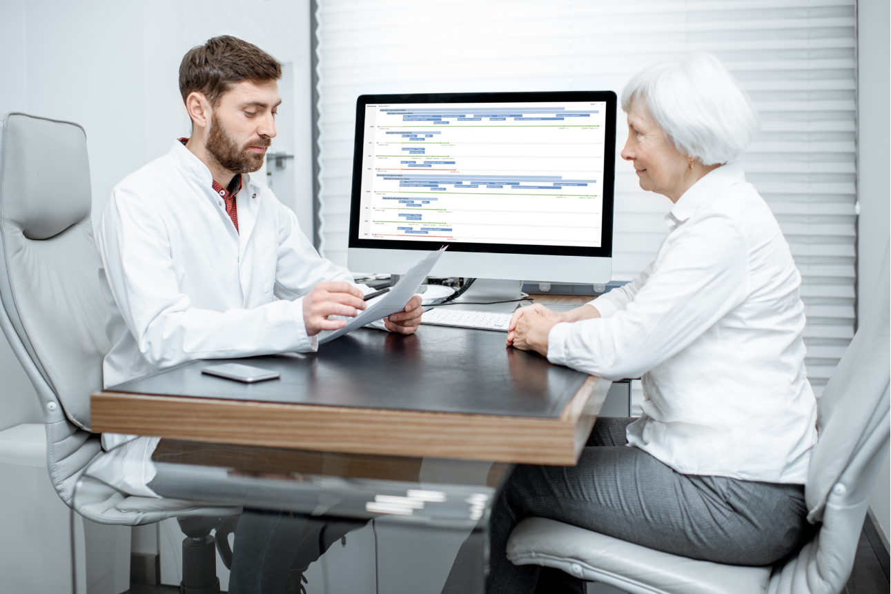 Senior woman consulting with doctor during a patient scheduling services appointment